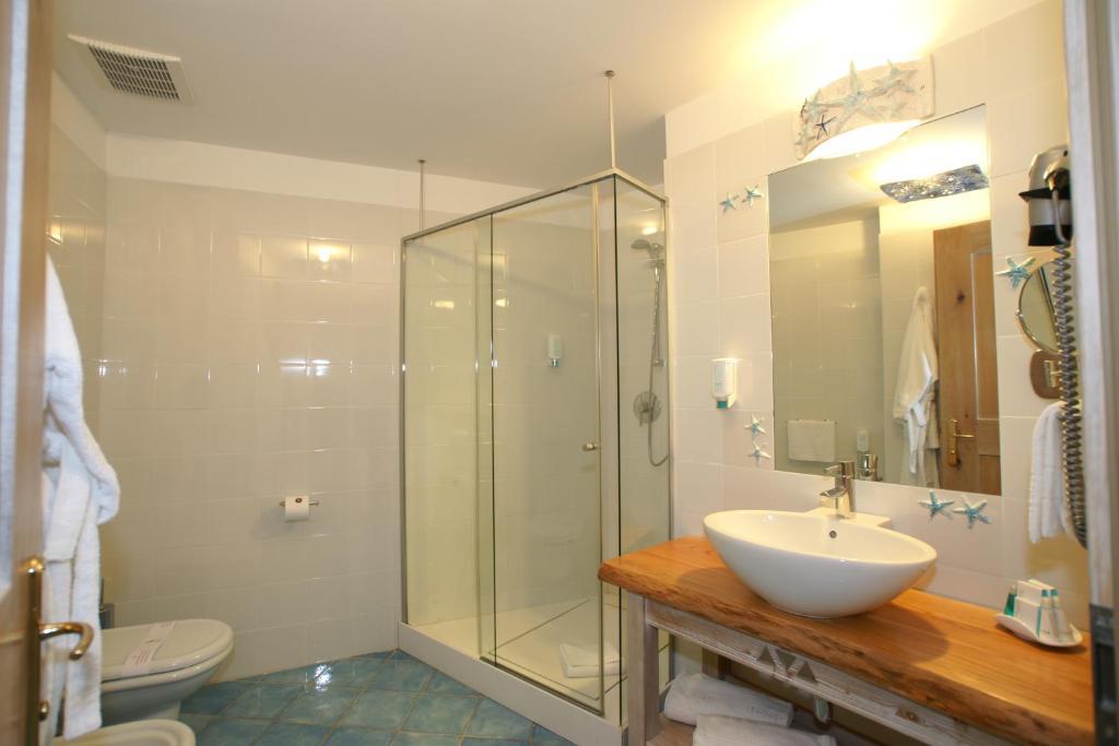 Hotel Resort&Spa Baia Caddinas Golfo Aranci Camera foto